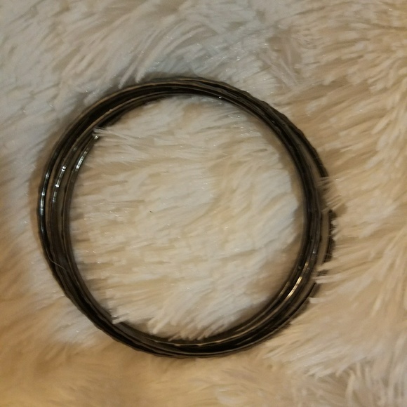 Interlocking bangle bracelets - Picture 3 of 3